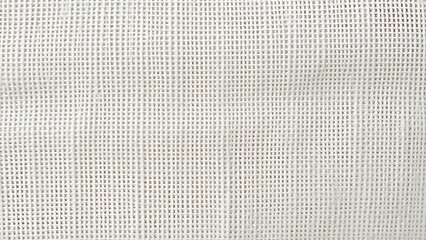 Close-up of natural linen fabric texture, highlighting woven fibers in soft neutral tones.
