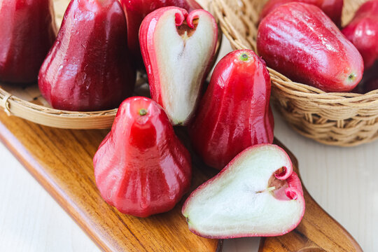 A beautiful and healthy display of freshly harvested Jambu Air (Water, Rose, Wax apples), perfect for a snack or dessert.