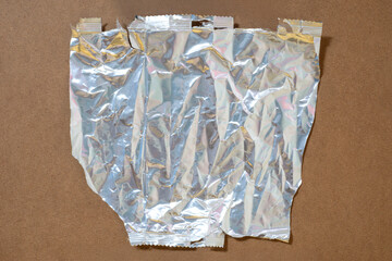 Crumpled Aluminum Foil Texture on Wood