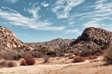 Dry desert valley under a vibrant sky