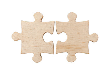Fototapeta premium Two light-brown wooden puzzle pieces joined