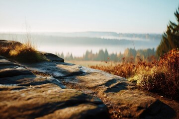 Rocky outcrop, autumn sunrise, misty hills