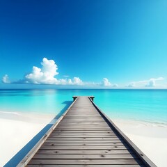 Obraz premium Wooden pier leading to turquoise ocean and white sand beach