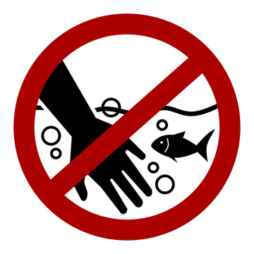 "Do not put hand into aquarium" sign