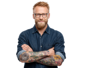 Confident hipster man with floral forearm tattoos glasses and beard wearing denim shirt arms crossed smiling isolated on transparency background modern style casual fashion