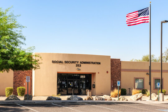 Social Security Administration office building with official signage, American flag, and accessible entrance, representing a federal government facility providing social services and public benefits