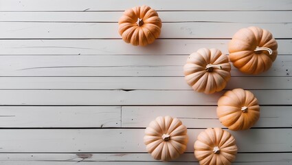Orange halloween pumpkins on white planks, halloween holiday decoration, festive autumn decor