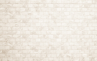 Detail of modern cream brick wall background photo. White light brick wall texture background for...