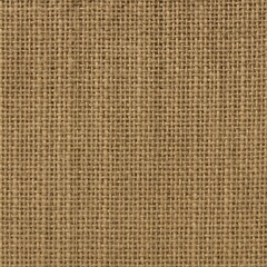 Fototapeta premium A detailed close-up of brown burlap fabric texture.