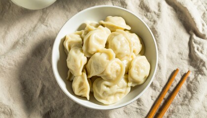 Homemade Dumplings in a Bowl: A Culinary Still Life, Delicious Dumplings Ready to Eat with...