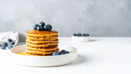 Golden Stack: Pancakes Drizzled with Syrup and Topped with Fresh Blueberries, Delicious Pancakes: A...
