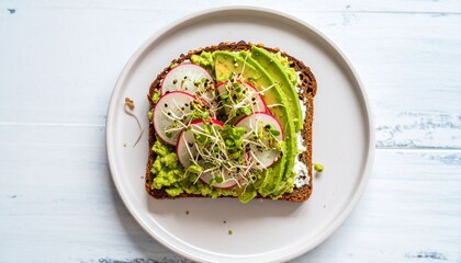 Avocado Toast on White Plate, Radish and Sprouts Garnished Toast, Avocado Toast with Radishes and...