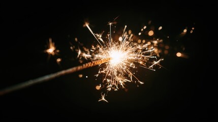 Sparkling sparkler against a black background