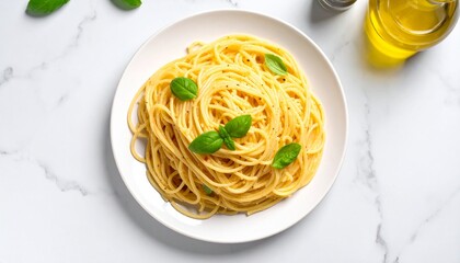 Delicious spaghetti with basil leaves on a white plate, Classic Italian cuisine presented on a marble surface with olive oil