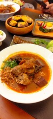 Thai Herb Sausage , Grilled crab fat, Grilled pork sausage wrapped in banana leaves ,Nam Ngiao Rice...