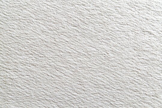 Close-up of a textured, off-white surface