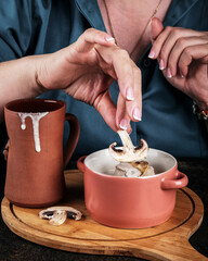 Savoring a Delicious Mushroom Preparation in Rustic and Charming Kitchenware