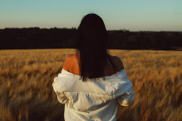 Woman in White Shirt Standing in Wheat Field