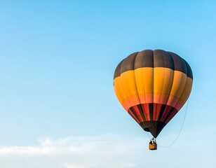 Obraz premium Colorful hot air balloon floats in clear blue sky