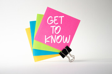 Get to Know symbol. Sticky Notes with words Get to Know. Beautiful white background. Business and...