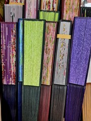 Traditional Korean handmade folding fans in various colors - Closeup