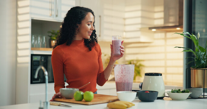Woman, blender and happy with glass in kitchen for healthy drink, diet and supplement for detox at home. Person, machine and smile for benefits, nutrition or gut health with wellness at apartment