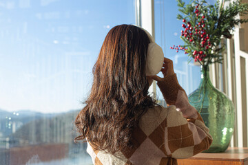 woman wearing a winter earmuffs