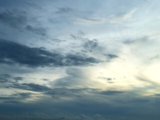 Blue Sky with White Fluffy Clouds. Natural Background for Weather, Nature, and Travel Concepts....