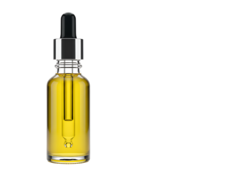 Close-up of a glass dropper bottle filled with yellow liquid isolated on a black background for