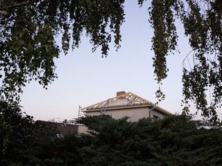 Rooftop framing and second-floor construction of family house vertical expansion project