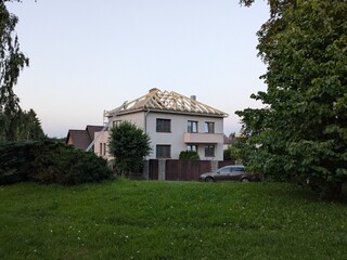 Rooftop framing and second-floor construction of family house vertical expansion project