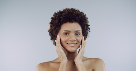 Portrait, black woman and skincare for smile, aesthetic and skin hydration on studio background....