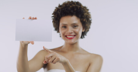 Portrait, beauty and woman with board for skincare, space or cosmetics on white background....