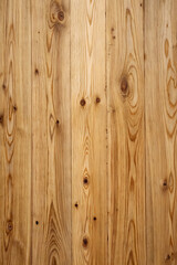 Naklejka premium An old, brown wooden plank wall with a natural textured wood grain pattern makes a great background
