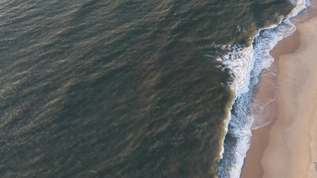 Ocean waves hit the coastline at sunset in Portugal 2 diferent motion from nr 1