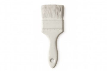 White paintbrush resting on transparent surface, representing artistic tools, home renovation, creative painting techniques
