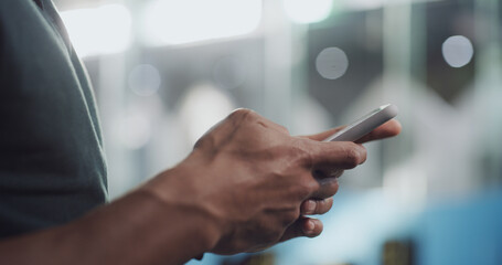 Phone, hands and business person in office for email, social media and review article. Mobile,...