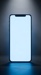 Smartphone with blank screen mockup on dark background with light spot