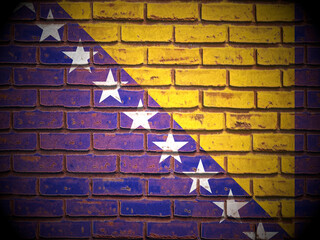 Old brick wall Bosnia and Herzegovina flag