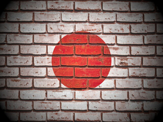 Old brick wall Japan flag