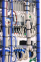 The reverse side of the electrical panel. Under copper insulated electrical wires to modules...