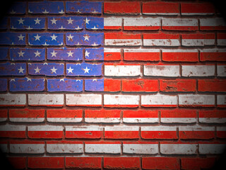 Old brick wall USA flag