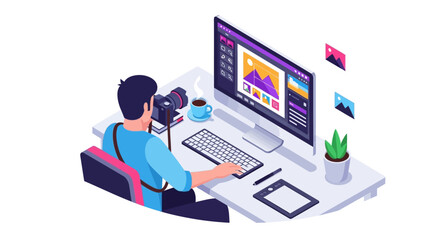 Graphic designer working on computer with camera and tablet