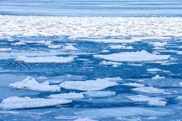 The sea where drift ice surges over
