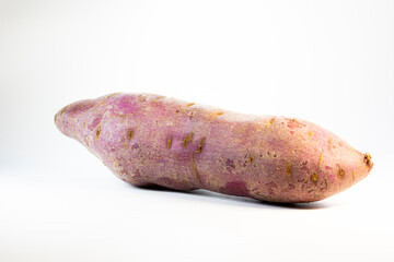 Sweet potatoes on white background
