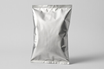 Blank silver foil snack pouch mockup. A metallic bag for chips, coffee, or food packaging, isolated on a gray background.