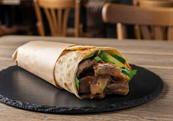 100% beef, thinly sliced, delicious local kebab wrap