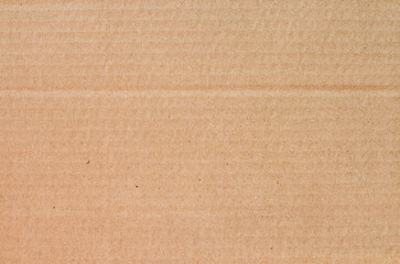 Cardboard sheet texture background, detail of recycle brown paper box pattern.