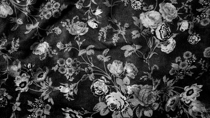 Photo background made of printed fabric. Chaotic folds. Ornament of different flowers and leaves....