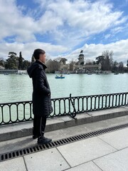 Contemplative Tourist: A solitary traveler finds solace and contemplation, gazing upon a tranquil...